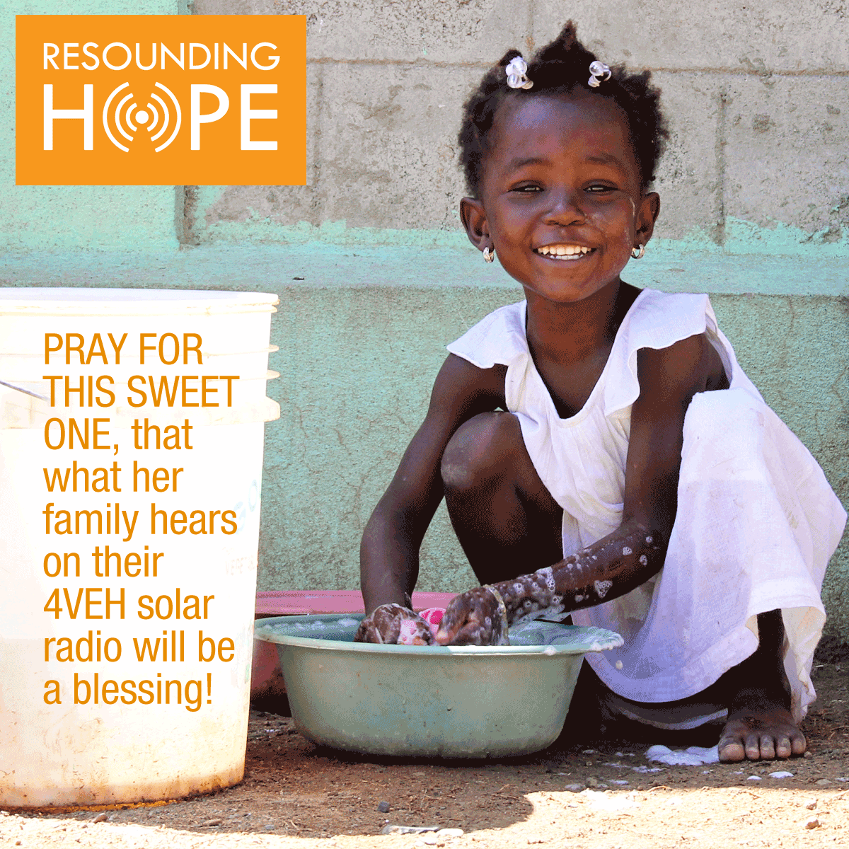 A young girl in Haiti in a moment of daily life, representing the communities Resounding Hope serves.